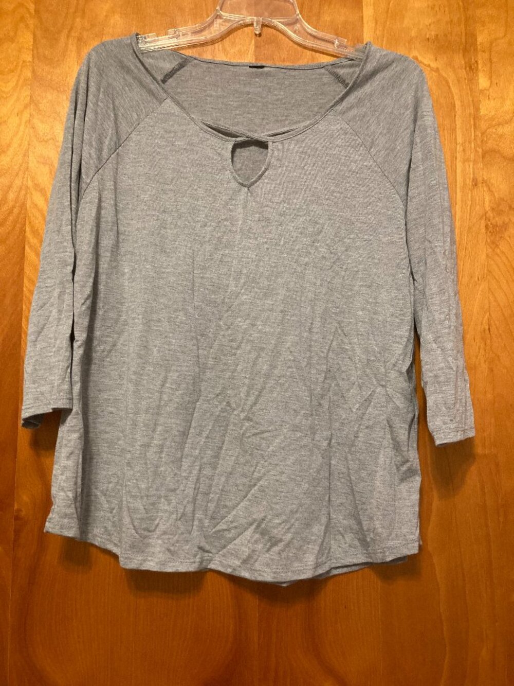 RBX activewear gray tunic top with a scoop neckline, 3/4 raglan sleeves M